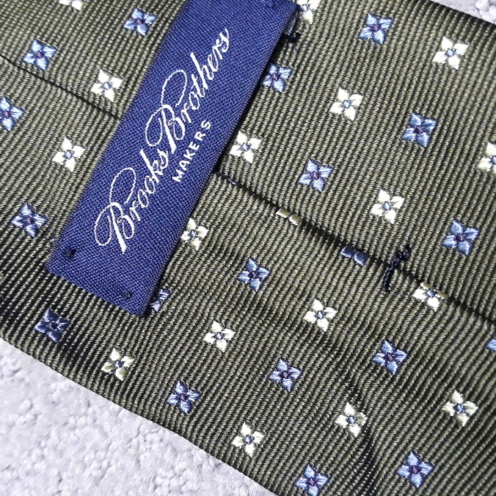 Brooks Brothers yellow and blue squares on a green background silk tie.